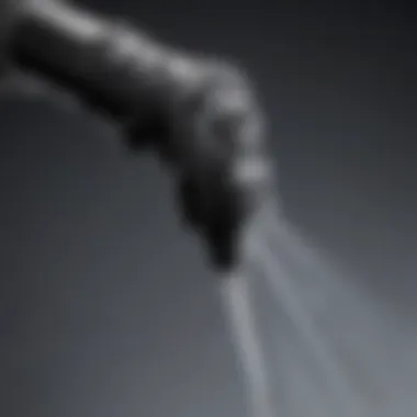 Close-up of a B&G pump sprayer nozzle demonstrating adjustable spray patterns.