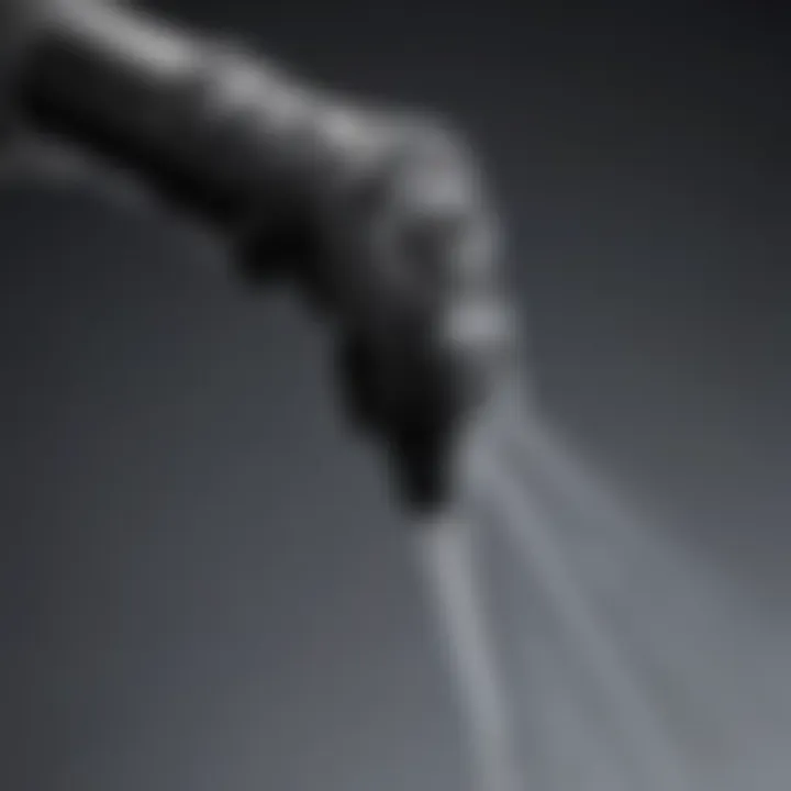 Close-up of a B&G pump sprayer nozzle demonstrating adjustable spray patterns.
