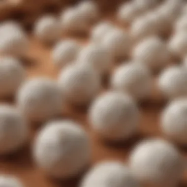 Close-up of Mothballs Scattered on Fabric Macro shot of mothballs scattered on fabric